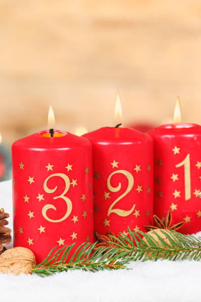 istock Third 3rd Sunday in advent with burning candle Christmas time decoration portrait format with copyspace copy space 2171784263