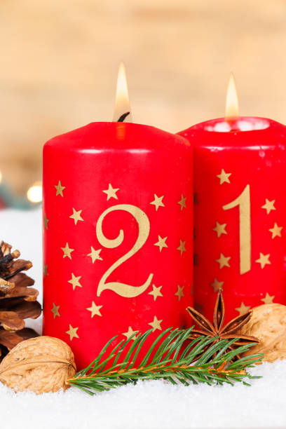 istock Second 2nd Sunday in advent with burning candle Christmas time decoration portrait format and copyspace copy space 2171784588