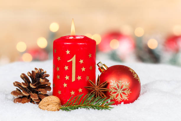 istock First 1st Sunday in advent with burning candle Christmas time decoration with copyspace copy space 2171784725