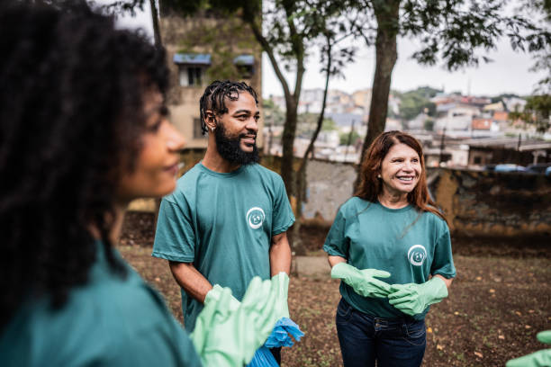 istock Group of volunteers talking at public park 2171791383