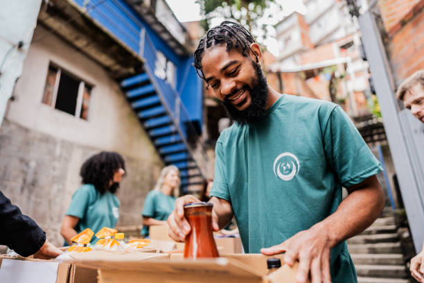 istock Young man organizing items to donation 2171791992