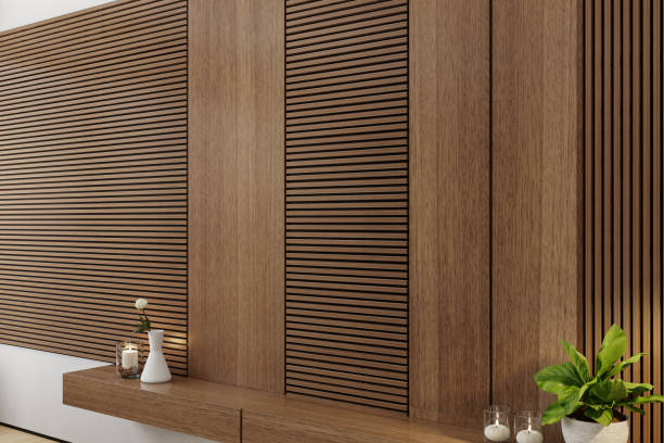Contemporary TV room featuring sleek pine wall paneling for a large TV screen mounted on the wall. The modern design emphasizes clean lines and natural materials, creating a sophisticated and inviting living space. The pine paneling adds warmth and texture, complementing the streamlined look of the room. Ideal for showcasing a stylish and functional entertainment area. Perfect for use in interior design features, home renovation articles, and promotional materials to highlight modern elegance and the seamless integration of technology with natural elements.