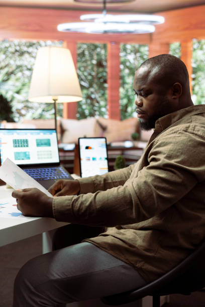 istock Entrepreneur explores potential business expansion plans on laptop 2171794023