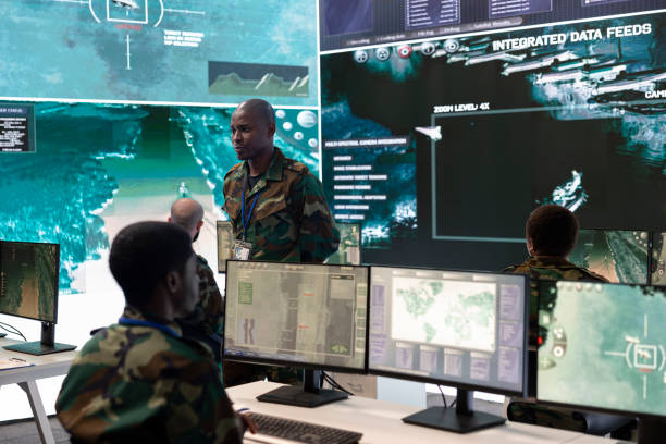 istock Weapons and targeting systems specialist examining surveillance footage 2171797771