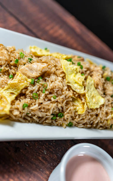 istock chaufa rice with chicken chunks, accompanied by homemade creams 2171798123