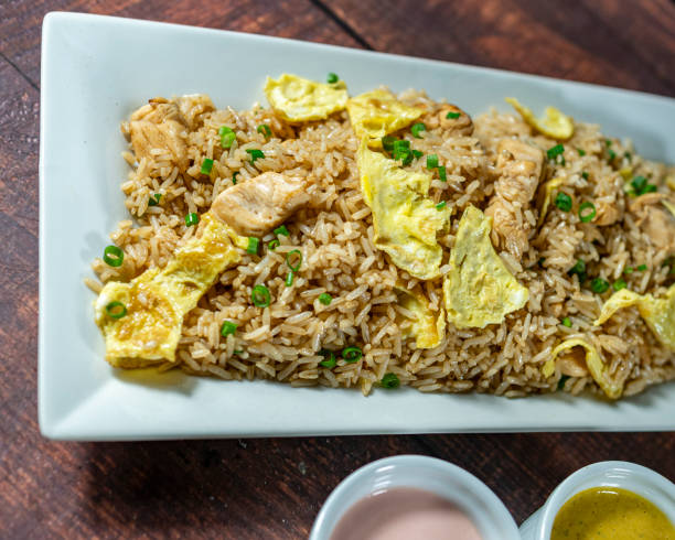 istock chaufa rice with chicken chunks, accompanied by homemade creams 2171798128