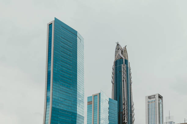 Glass modern skyscrapers architecture with grey sky