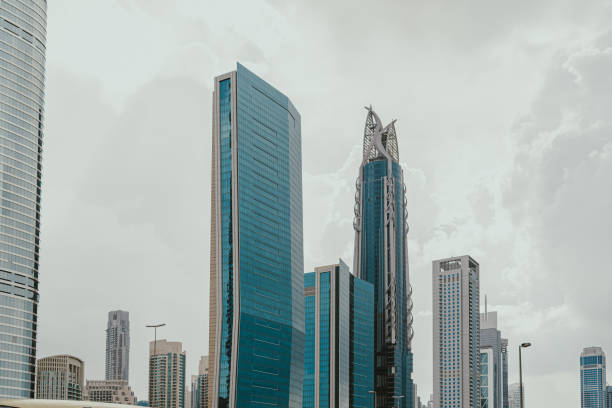 Glass modern skyscrapers architecture with grey sky