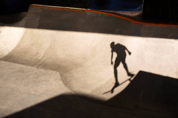istock Shadow of skateboarder 2171807829