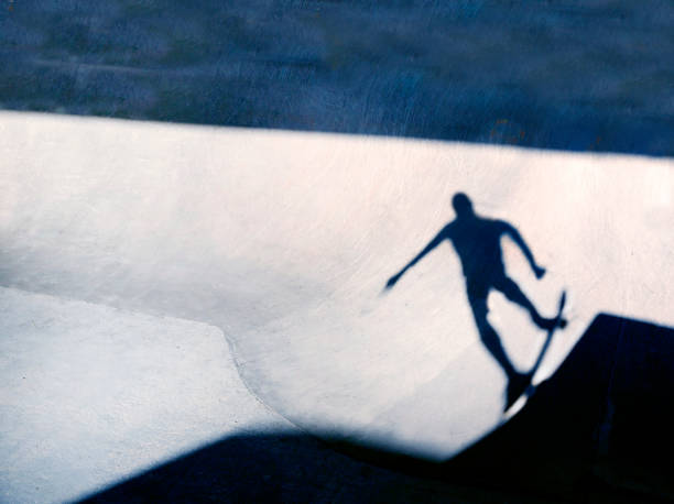 istock Shadow of skateboarder 2171807898