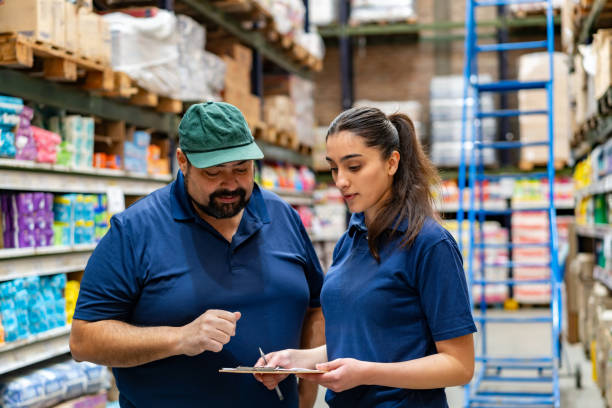 istock Employees working at a supermarket and checking the inventory 2171819242
