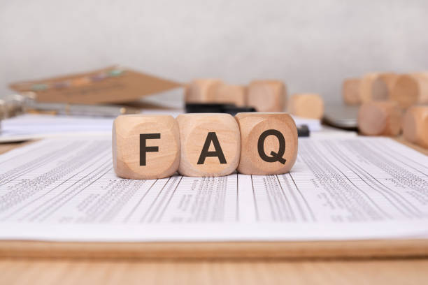 istock An FAQ Concept utilizing Wooden Blocks along with Organized Documents for clarity and structure 2171833750