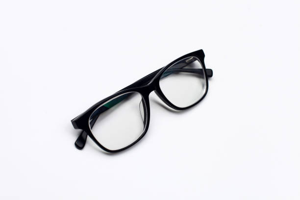 istock Pair of folded black glasses 2171844994