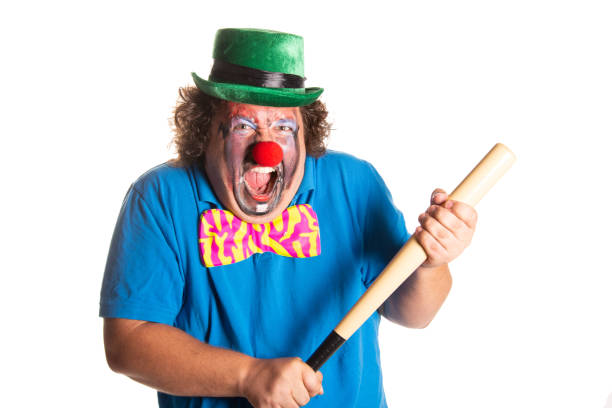 istock Evil clown from horror movies posing on a white background. 2171856178