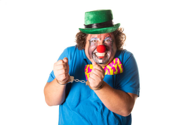 istock Evil clown from horror movies posing on a white background. 2171856259