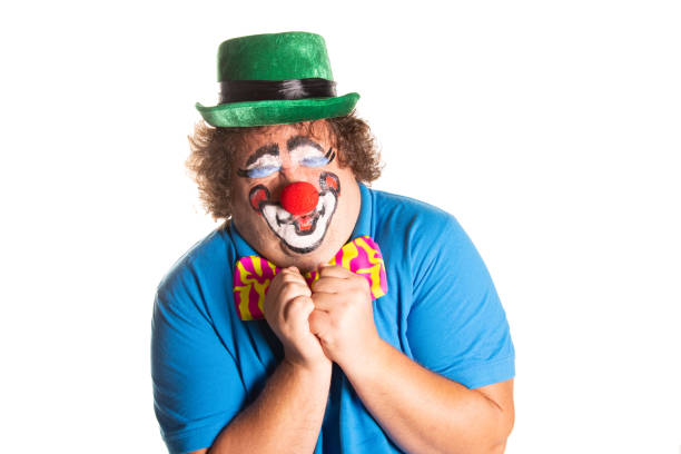 istock Funny fat clown posing on a white background. 2171856337