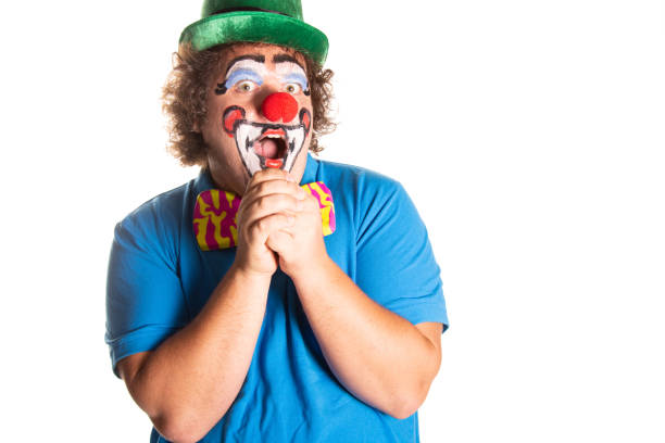 istock Funny fat clown posing on a white background. 2171856351