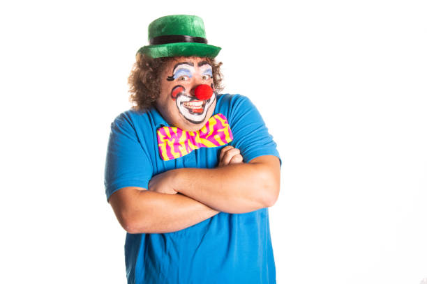 istock Funny fat clown posing on a white background. 2171856363