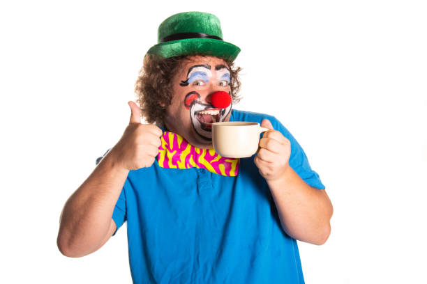 istock Funny fat clown posing on a white background. 2171856440