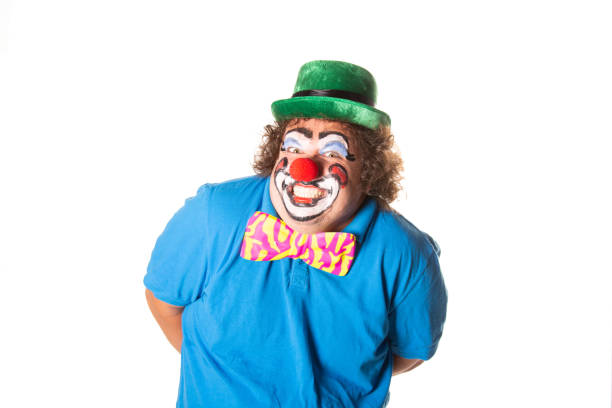 istock Funny fat clown posing on a white background. 2171856482