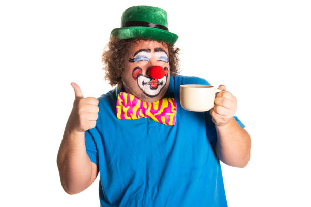 istock Funny fat clown posing on a white background. 2171856544