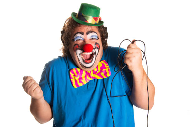 istock Funny fat clown posing on a white background. 2171856600