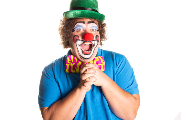 istock Funny fat clown posing on a white background. 2171856620