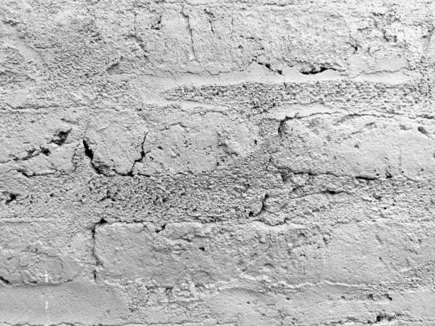 Old white brick wall texture. Abstract background for design. Monochrome