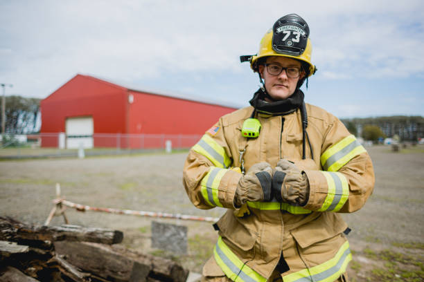 istock Brave Female Firefighter In Uniform Portrait 2171867263