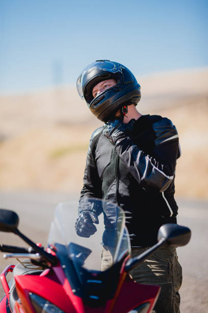 istock Motorcyclist Riding Motorcycle On a Summer Day 2171868707