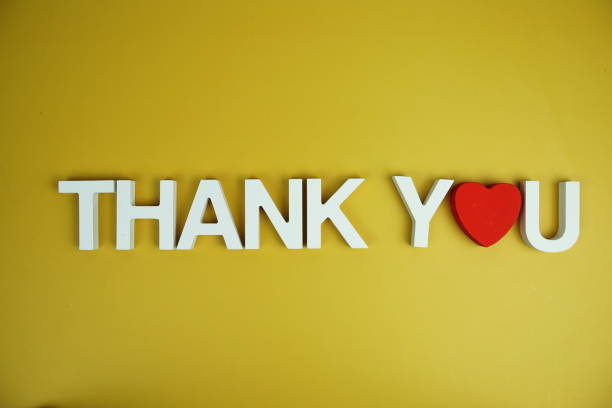 istock Thank You alphabet letters top view on yellow background 2171873364