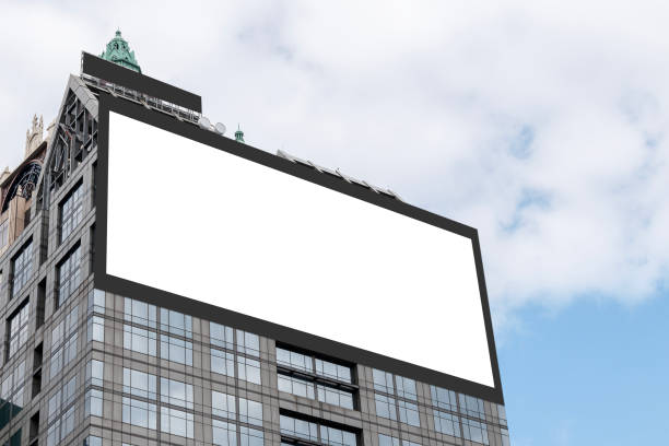 istock Mock up white LED display billboard on tower building with blue sky background .clipping path for mockup 2171873871