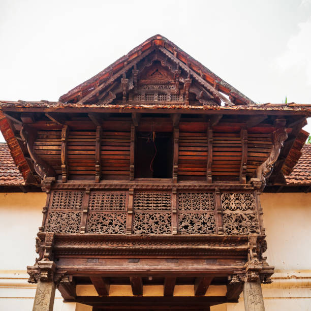 Front exterior of the house in colonial architecture style. Traditional facade of a house with window and lanterns. Typical Portuguese ancient architecture. Old cozy house in historical old town