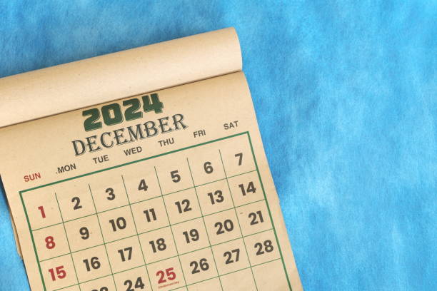 istock December 2024 calendar flat lay in blue background with copy space. 2171884266