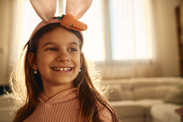 istock Cute girl wearing bunny ears 2171884571