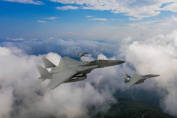 istock Jet fighters flying over the clouds. 2171887075