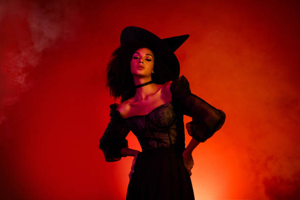 istock Photo of devil evil conjurer lady powerful satan appear from hell red mist background on halloween night 2171889007
