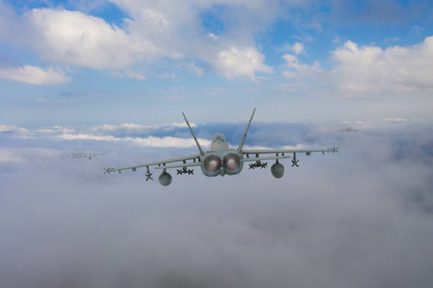 istock Jet fighters flying over the clouds. 2171898789
