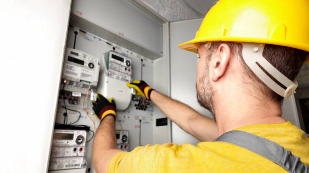 istock Technician working on a modern electricity power meter station in a building. 2171900616