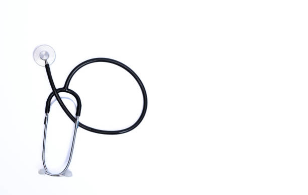 Black medical stethoscope isolated on white background on the left side, banner background