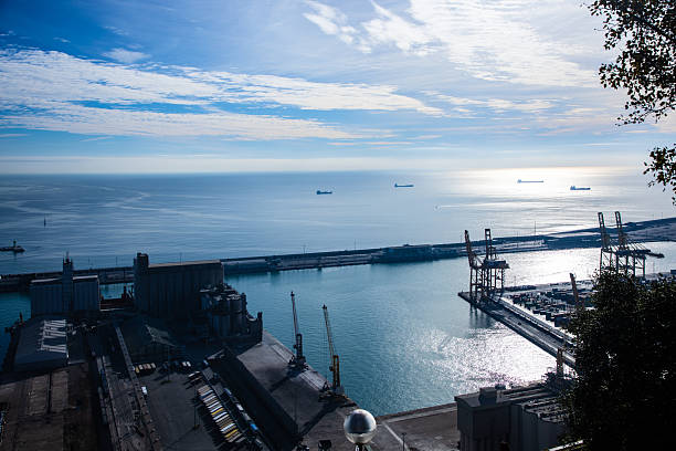 Kent, UK - September 14, 2024:  Contrails drawn on blue sky over Dover strait