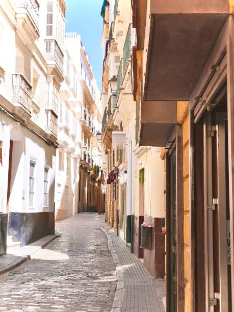 istock Narrow road and buildings 2171929406