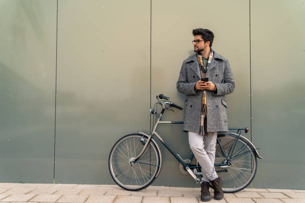 istock Businessman on Break with Bicycle and Smartphone 2171954047
