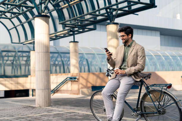 istock Smiling Businessman with Bicycle on Urban Break 2171954067