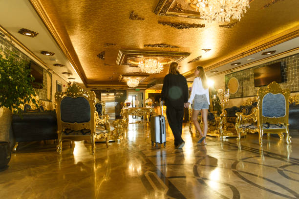 istock Couple Entering Luxurious Hotel Lobby 2171955669