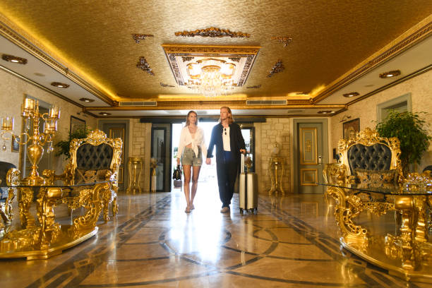 istock Couple Entering Luxurious Hotel Lobby 2171955740