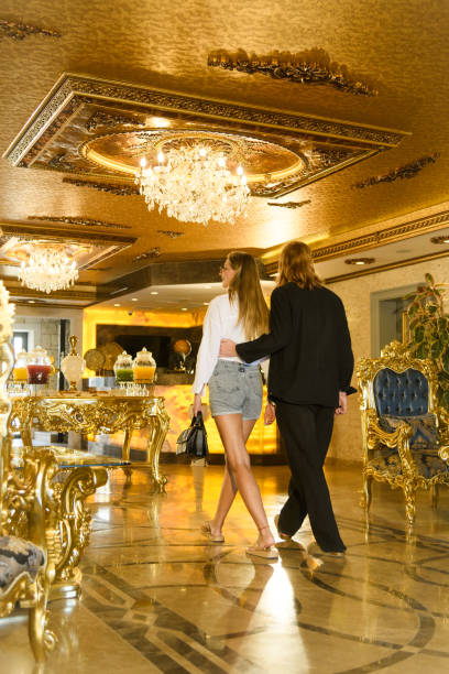 istock Couple Entering Luxurious Hotel Lobby 2171955750