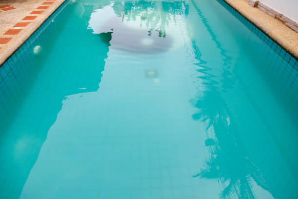 istock A swimming pool with cloudy, murky water, indicating potential maintenance issues and poor water clarity 2171961093