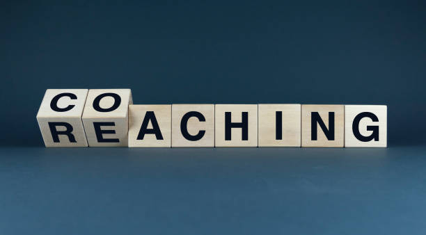 istock A conceptual image of wooden blocks spelling out 'coaching' and 'reaching' 2171963765