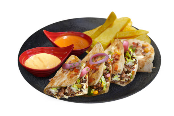 istock DE LOMO QUESADILLA Triangles filled with Ground beef, cheese, pickled onions, iceberg 2171974456